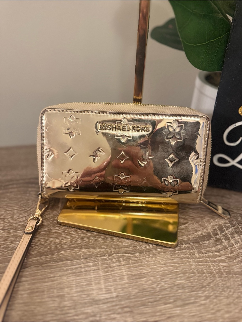 Michael Kors Metallic Rose Gold Embossed Zip Wristlet wallet